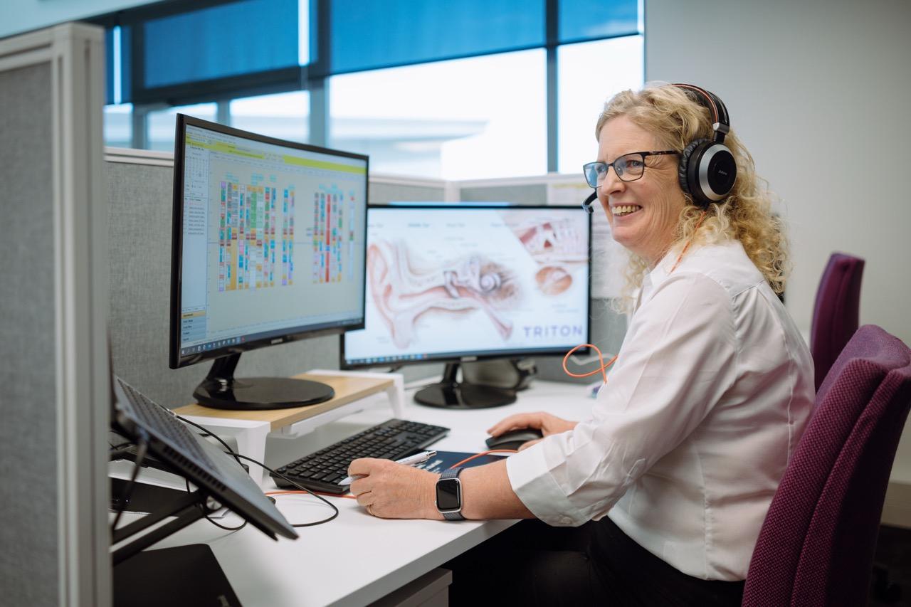 Worker with hearing protection